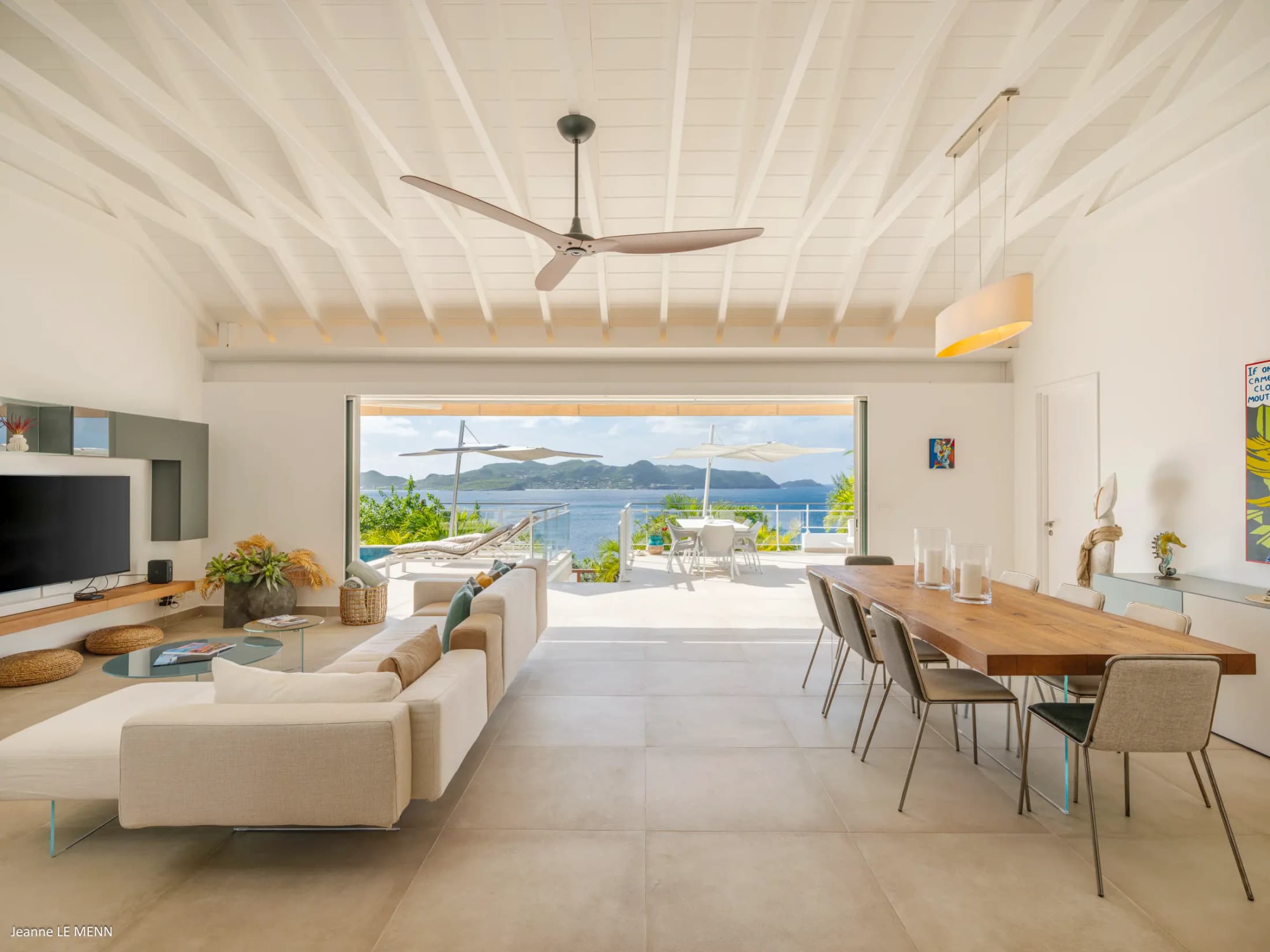 Open-plan living room with panoramic Caribbean sea view — photo 05